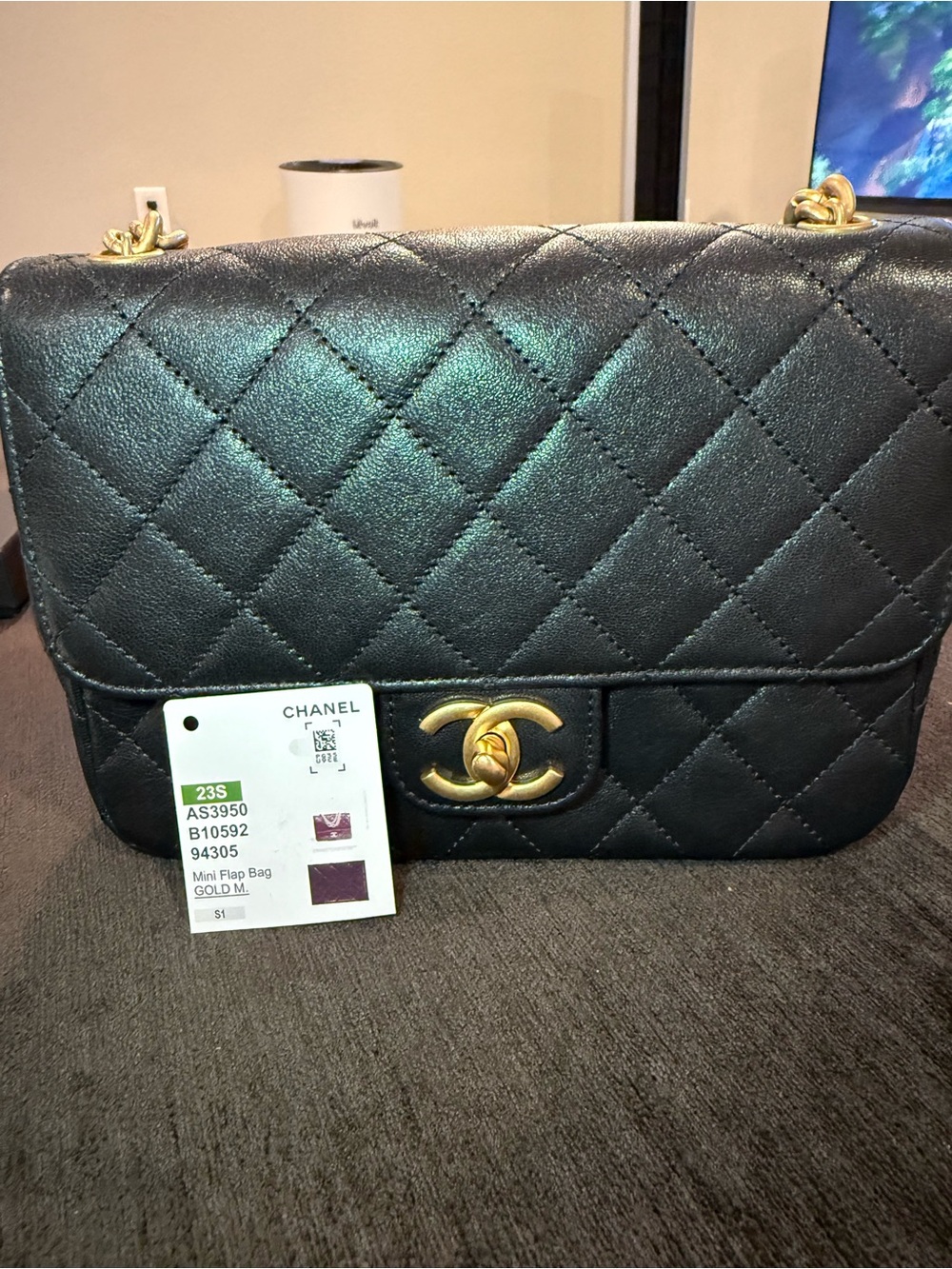 CHANEL Black Quilted Mini Flap Shoulder Bag with Gold Hardware